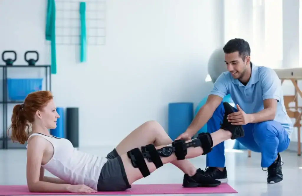 Woman having treatment to help muscle recovery Northwich after an injury